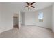 A bright and spacious bedroom with soft carpet, an open closet, and neutral paint at 3718 True Spring Pl, North Las Vegas, NV 89032