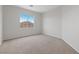 An inviting bedroom with neutral carpet and bright natural light at 3718 True Spring Pl, North Las Vegas, NV 89032