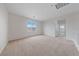 A large carpeted bonus room with recessed lighting and bright natural light at 3718 True Spring Pl, North Las Vegas, NV 89032