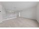 An open concept bonus room with bright recessed lighting and a staircase at 3718 True Spring Pl, North Las Vegas, NV 89032