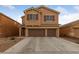 Beautiful two-story home showcasing a three-car garage and appealing neutral exterior at 3718 True Spring Pl, North Las Vegas, NV 89032