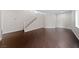 Spacious living area with hardwood floors, a staircase, and ample natural light at 3718 True Spring Pl, North Las Vegas, NV 89032