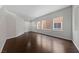Inviting living room featuring hardwood floors, bright windows, and neutral paint at 3718 True Spring Pl, North Las Vegas, NV 89032