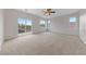 Large main bedroom with natural light and a sliding glass door to outdoor balcony at 3718 True Spring Pl, North Las Vegas, NV 89032