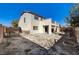 Exterior view of home featuring patio and large backyard at 4225 Ponce Royal Ave, North Las Vegas, NV 89031