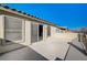 View of stucco exterior and windows from the balcony with iron railing at 4225 Ponce Royal Ave, North Las Vegas, NV 89031