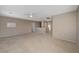 Expansive carpeted bonus room with ceiling lights and whiteboard at 4225 Ponce Royal Ave, North Las Vegas, NV 89031