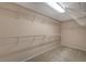 Walk-in closet with installed wire shelving for optimal storage space at 4225 Ponce Royal Ave, North Las Vegas, NV 89031