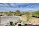 Community aerial view featuring circular street, desert landscaping, and mountain views at 4225 Ponce Royal Ave, North Las Vegas, NV 89031