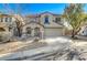Charming two-story home with well-kept front yard landscaping and a two car garage at 4225 Ponce Royal Ave, North Las Vegas, NV 89031