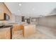 Inviting kitchen features stainless steel appliances, light wood cabinetry, and an island open to the living space at 4225 Ponce Royal Ave, North Las Vegas, NV 89031