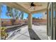 Relaxing covered patio with ceiling fan and view of the backyard at 4225 Ponce Royal Ave, North Las Vegas, NV 89031