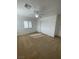 Neutral carpeted bedroom with a ceiling fan and a large closet at 4236 Thomas Patrick Ave, North Las Vegas, NV 89032