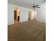 Bedroom featuring a ceiling fan, carpet, and view of the bathroom and closet at 4236 Thomas Patrick Ave, North Las Vegas, NV 89032
