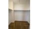 Walk in closet features carpet and shelves for optimal storage and organization at 4236 Thomas Patrick Ave, North Las Vegas, NV 89032