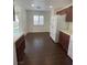Bright kitchen featuring ample cabinet space, stainless steel appliances, and backyard access at 4236 Thomas Patrick Ave, North Las Vegas, NV 89032