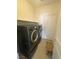 Practical laundry room featuring modern washer and dryer units at 4236 Thomas Patrick Ave, North Las Vegas, NV 89032