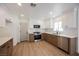 This is a kitchen with stainless steel appliances and two-tone cabinetry at 427 Wright Way, Henderson, NV 89015