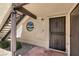 Charming front entrance with an ornate security door and a decorative glass window next to the stairs at 5070 Jeffreys St # 101, Las Vegas, NV 89119