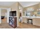 Spacious bathroom with double vanity, tile flooring and mounted tv at 5335 Duralite St # 203, Las Vegas, NV 89122