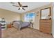 Cozy carpeted bedroom with natural light and standard closet at 5335 Duralite St # 203, Las Vegas, NV 89122
