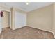 Neutral bedroom with closet and neutral colored carpet at 5335 Duralite St # 203, Las Vegas, NV 89122
