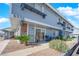 Building exterior with visible unit number and tidy landscaping at 5335 Duralite St # 203, Las Vegas, NV 89122