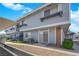 Charming two-story home with landscaped front, complemented by a brick accent and cozy patio at 5335 Duralite St # 203, Las Vegas, NV 89122