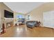 Inviting living room features a cozy fireplace, neutral colors, and plenty of natural light at 5335 Duralite St # 203, Las Vegas, NV 89122