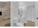 Modern bathroom features new vanity, black hardware, and updated lighting at 57 Marion Dr, Las Vegas, NV 89110