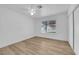Bedroom features wood-look floors, window and sliding closet at 57 Marion Dr, Las Vegas, NV 89110