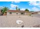Charming single story home with low maintenance landscaping, and a two-car garage at 57 Marion Dr, Las Vegas, NV 89110
