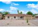 Charming single-story home featuring a desert-landscaped front yard and a neutral color scheme at 57 Marion Dr, Las Vegas, NV 89110