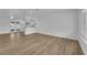 Bright open-concept living room and kitchen with stainless appliances at 57 Marion Dr, Las Vegas, NV 89110