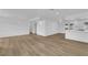 Spacious living room features recessed lights and wood-look floors throughout at 57 Marion Dr, Las Vegas, NV 89110