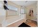 Relaxing bathroom with a soaking tub and glass-enclosed shower at 6030 Hidden Summit St, North Las Vegas, NV 89031