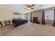 Comfortable main bedroom with neutral tones, ample space, and natural light at 6030 Hidden Summit St, North Las Vegas, NV 89031