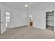 Neutral Primary bedroom with carpet, ensuite bathroom and walk-in closet at 8112 Broken Spur Ln, Las Vegas, NV 89131