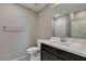 Bathroom boasts a single sink, vanity, and nearby shower for convenient access at 8487 Insignia Ave # 105, Las Vegas, NV 89178