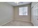 Bedroom boasts a large window, closet, and neutral walls, perfect for relaxation at 8487 Insignia Ave # 105, Las Vegas, NV 89178