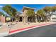 Community clubhouse featuring desert landscaping at 8487 Insignia Ave # 105, Las Vegas, NV 89178