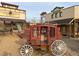 Play area featuring a stagecoach, vintage buildings, and a slide at 8487 Insignia Ave # 105, Las Vegas, NV 89178