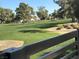 Scenic view of lush community golf course and mature trees at 940 Vegas Valley Dr, Las Vegas, NV 89109