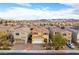 Charming two-story home featuring a well-maintained front yard and a two-car garage in a Gathering-friendly community at 996 Cetona Ct, Henderson, NV 89011