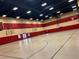 This modern gym features basketball hoops, multiple entrances, and room for activities at 996 Cetona Ct, Henderson, NV 89011