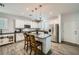 Bright kitchen with stainless steel appliances, granite countertops, and a center island with bar seating at 996 Cetona Ct, Henderson, NV 89011