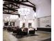 A community lobby features elegant chandeliers, beautiful wood beams, comfortable seating, and decor at 996 Cetona Ct, Henderson, NV 89011