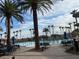 Resort-style pool featuring palm trees and patio seating to provide a relaxing community space at 996 Cetona Ct, Henderson, NV 89011