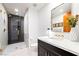 Bathroom with modern vanity, glass shower, and elegant gold fixtures at 11441 Allerton Park Dr # 212, Las Vegas, NV 89135