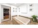 Bathroom with a soaking tub and walk-in access to the walk-in closet at 11441 Allerton Park Dr # 212, Las Vegas, NV 89135